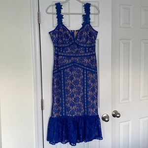 Women’s blue lace dress with nude/tan underlay